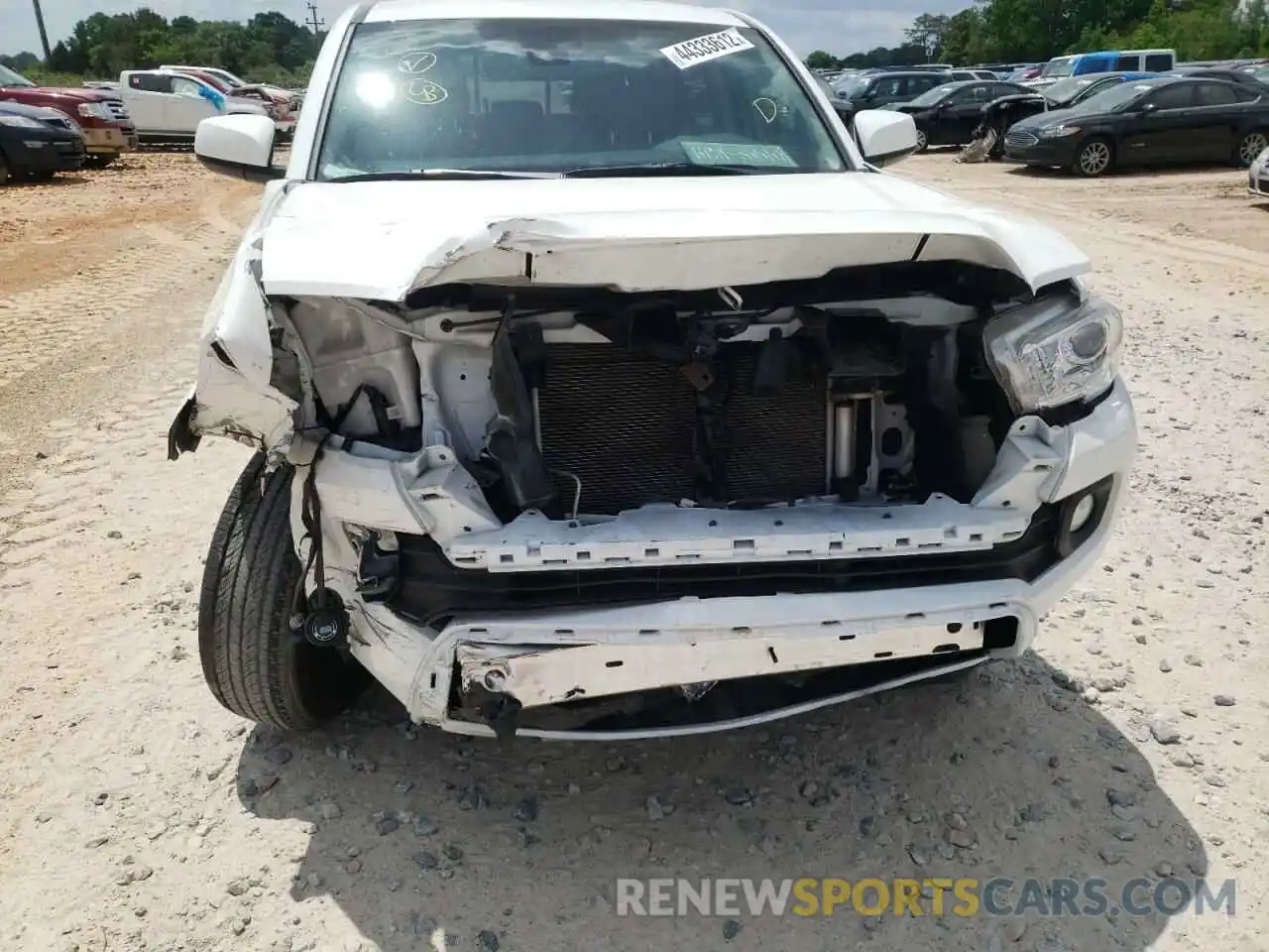 9 Photograph of a damaged car 5TFAZ5CN4MX108908 TOYOTA TACOMA 2021