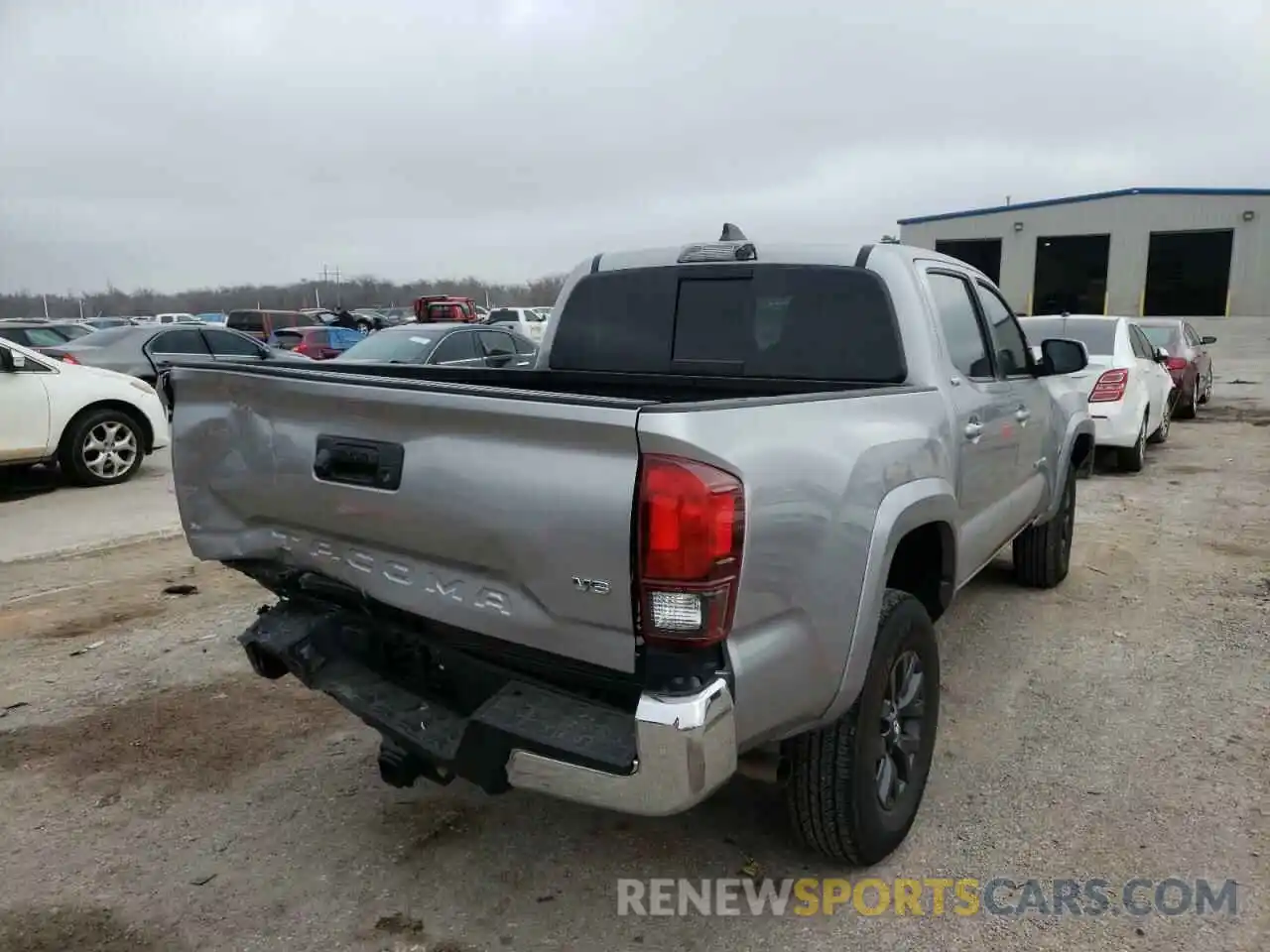 4 Photograph of a damaged car 5TFAZ5CN4MX108990 TOYOTA TACOMA 2021