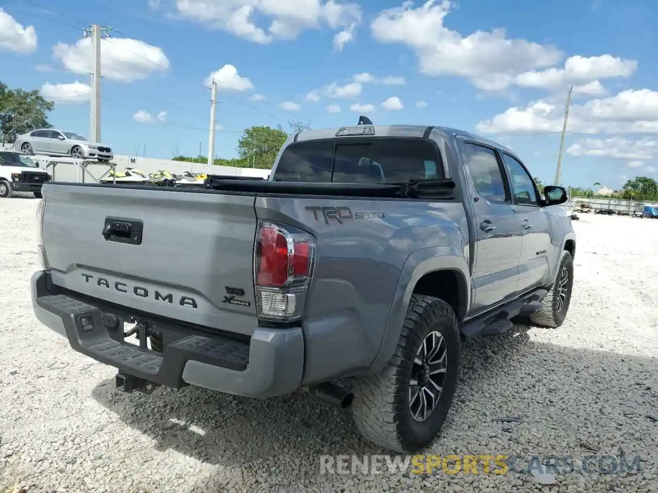 4 Photograph of a damaged car 5TFAZ5CN4MX111095 TOYOTA TACOMA 2021