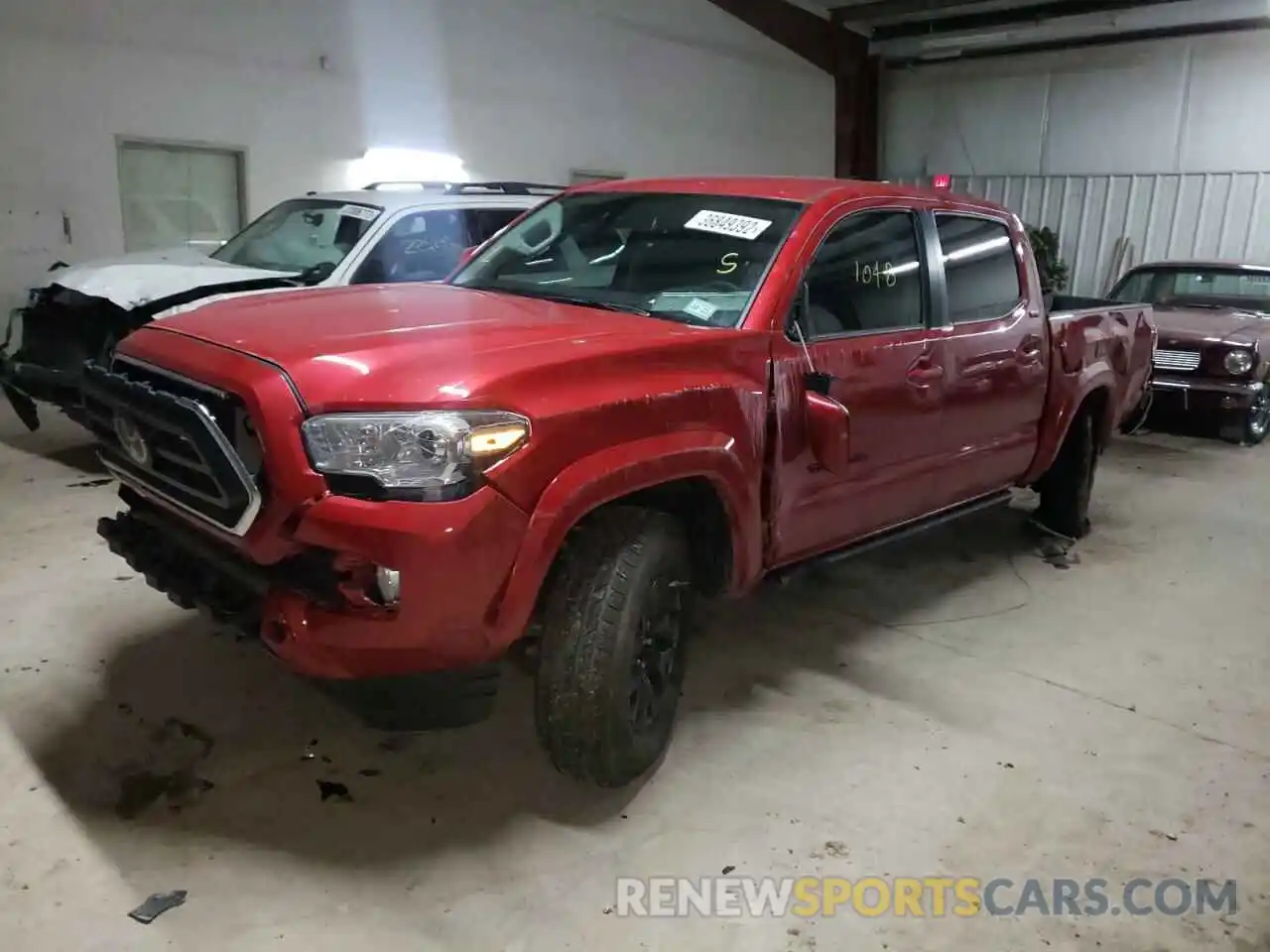 2 Photograph of a damaged car 5TFAZ5CN4MX114580 TOYOTA TACOMA 2021