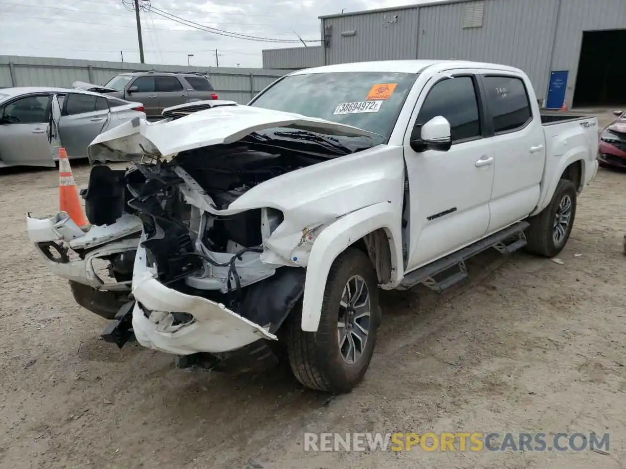 2 Photograph of a damaged car 5TFAZ5CN5MX098941 TOYOTA TACOMA 2021