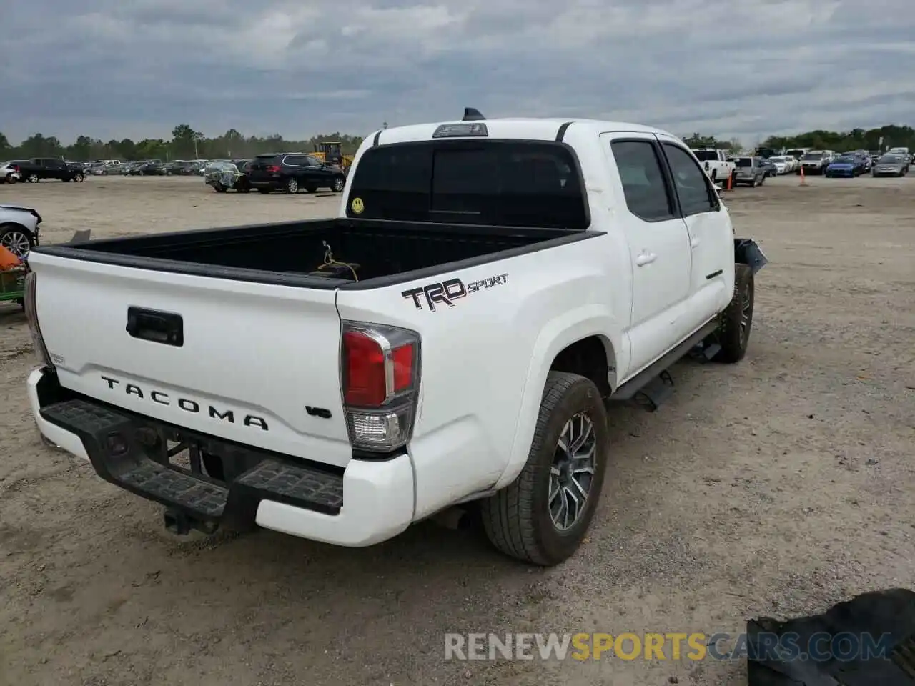 4 Photograph of a damaged car 5TFAZ5CN5MX098941 TOYOTA TACOMA 2021