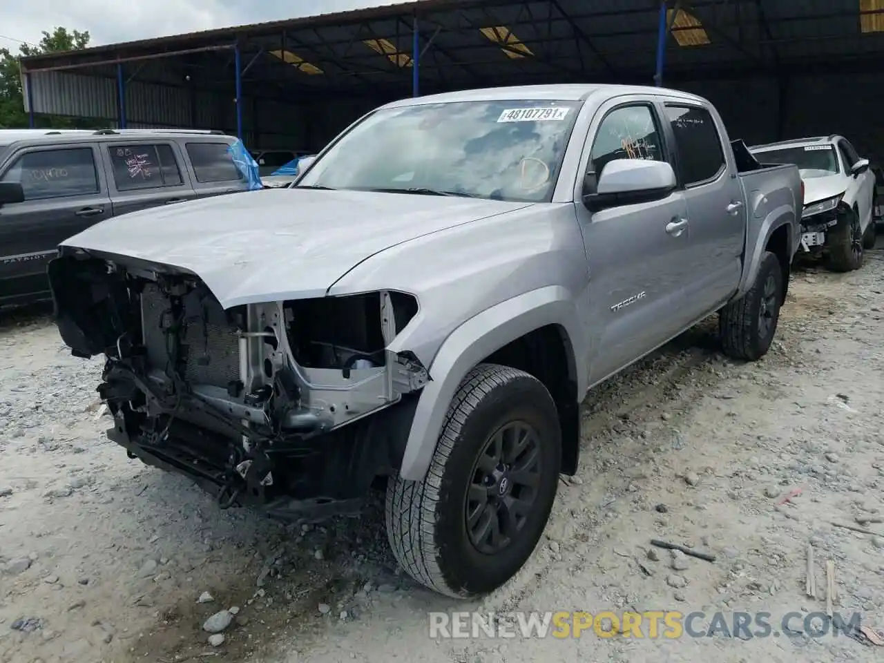 2 Photograph of a damaged car 5TFAZ5CN5MX099457 TOYOTA TACOMA 2021