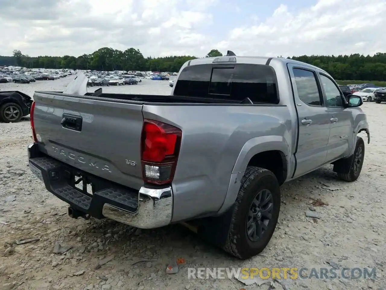 4 Photograph of a damaged car 5TFAZ5CN5MX099457 TOYOTA TACOMA 2021