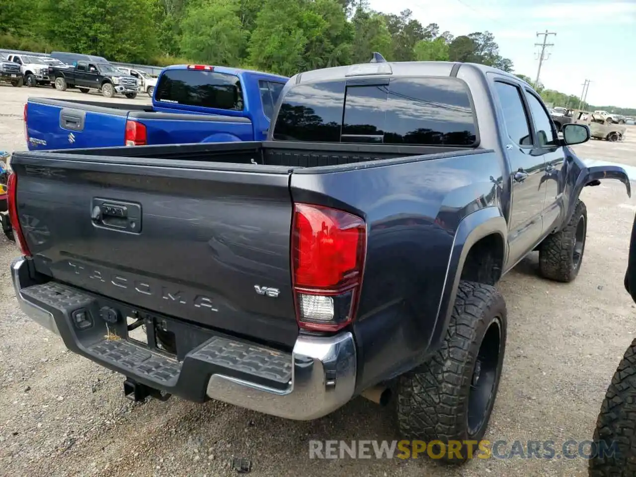 4 Photograph of a damaged car 5TFAZ5CN5MX099541 TOYOTA TACOMA 2021