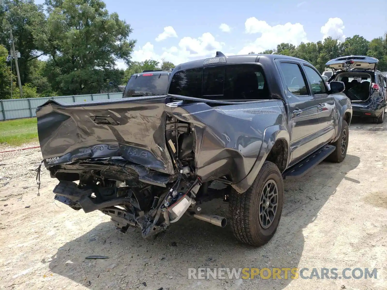 4 Photograph of a damaged car 5TFAZ5CN5MX100168 TOYOTA TACOMA 2021