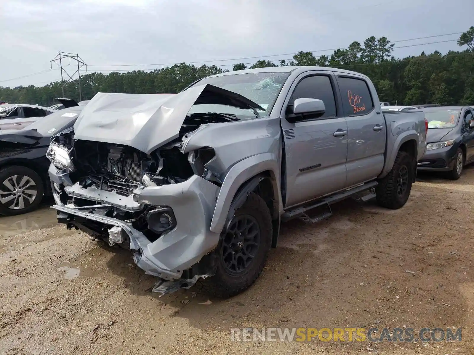 2 Photograph of a damaged car 5TFAZ5CN5MX106939 TOYOTA TACOMA 2021