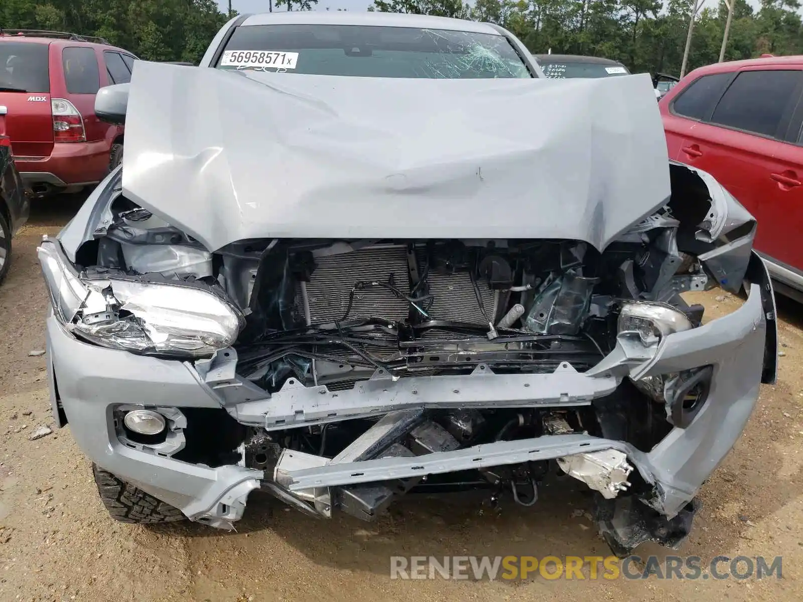 9 Photograph of a damaged car 5TFAZ5CN5MX106939 TOYOTA TACOMA 2021