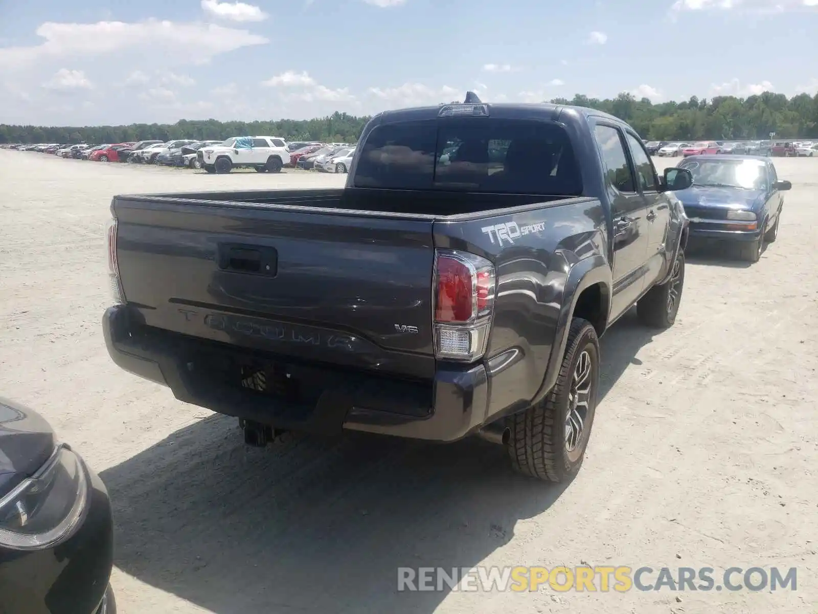 4 Photograph of a damaged car 5TFAZ5CN5MX109954 TOYOTA TACOMA 2021