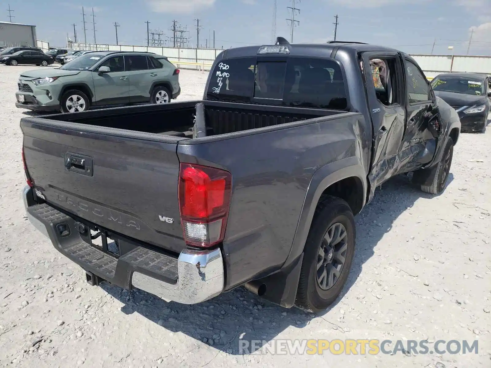 4 Photograph of a damaged car 5TFAZ5CN5MX115561 TOYOTA TACOMA 2021