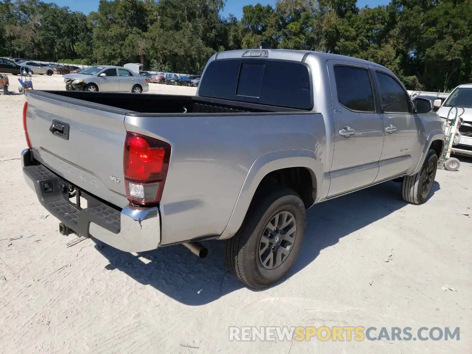 4 Photograph of a damaged car 5TFAZ5CN5MX115575 TOYOTA TACOMA 2021