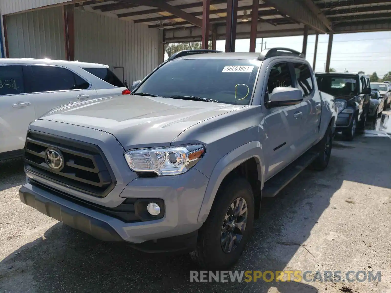 2 Photograph of a damaged car 5TFAZ5CN6MX099502 TOYOTA TACOMA 2021