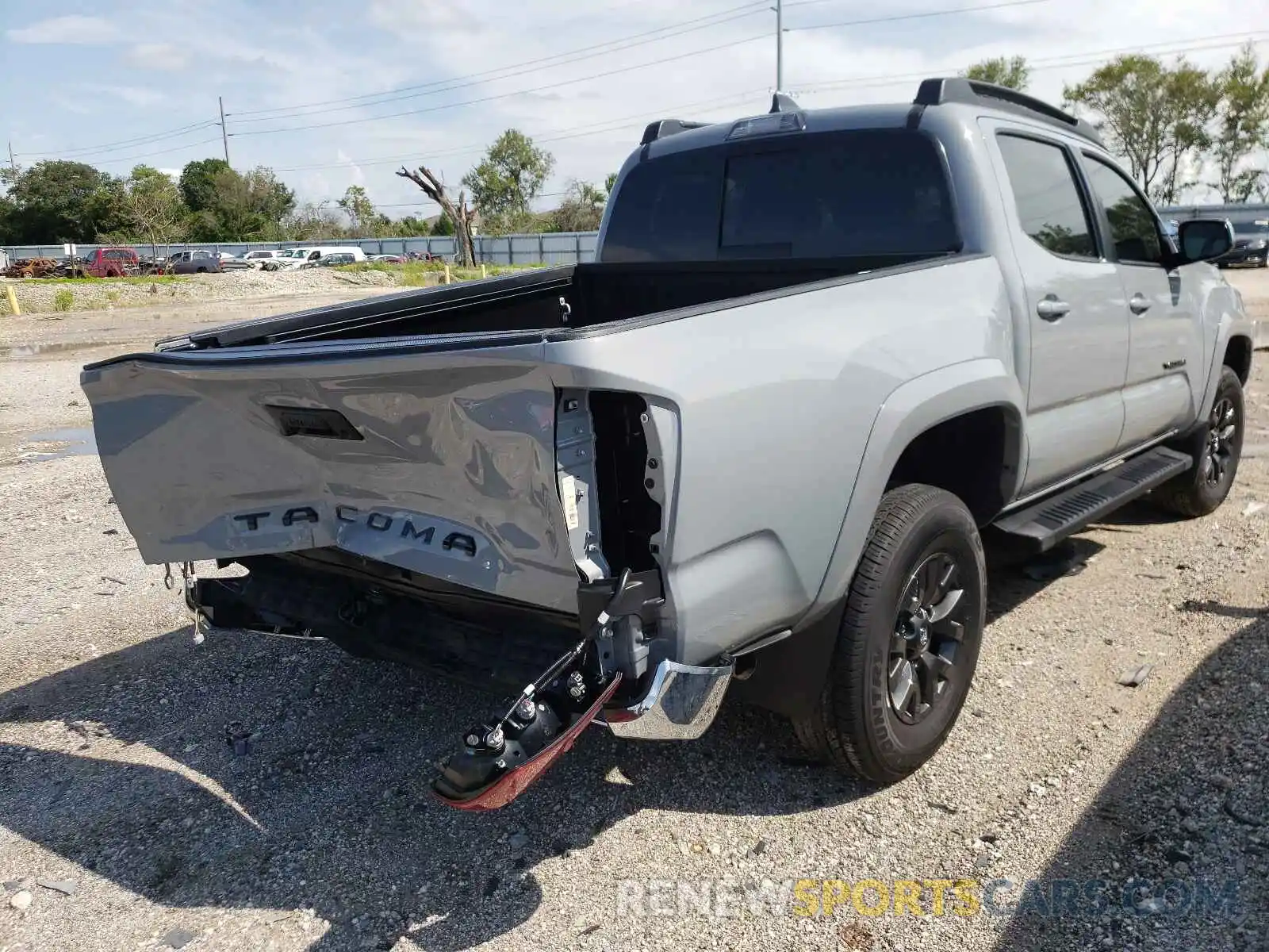 4 Photograph of a damaged car 5TFAZ5CN6MX099502 TOYOTA TACOMA 2021