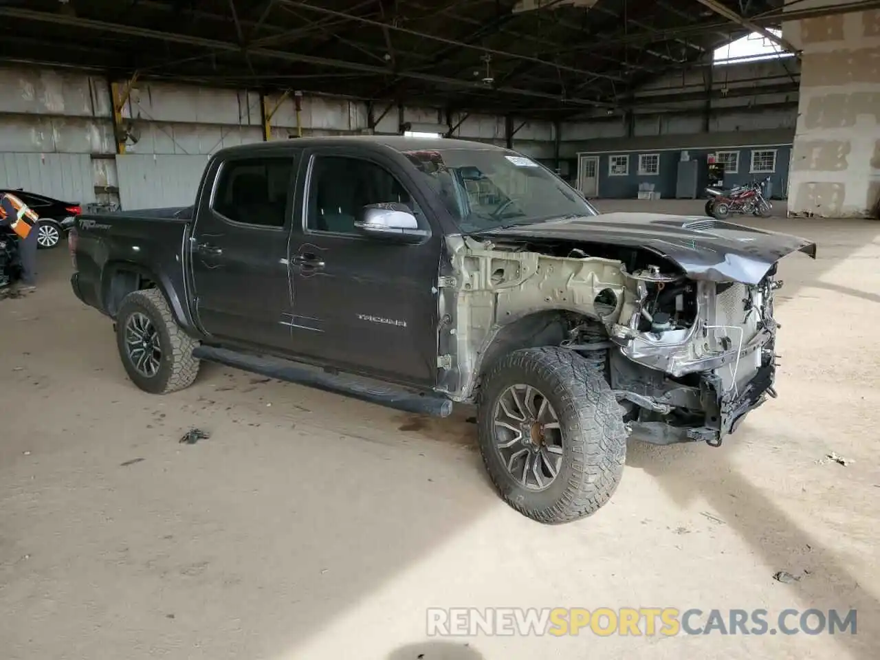 4 Photograph of a damaged car 5TFAZ5CN6MX099564 TOYOTA TACOMA 2021