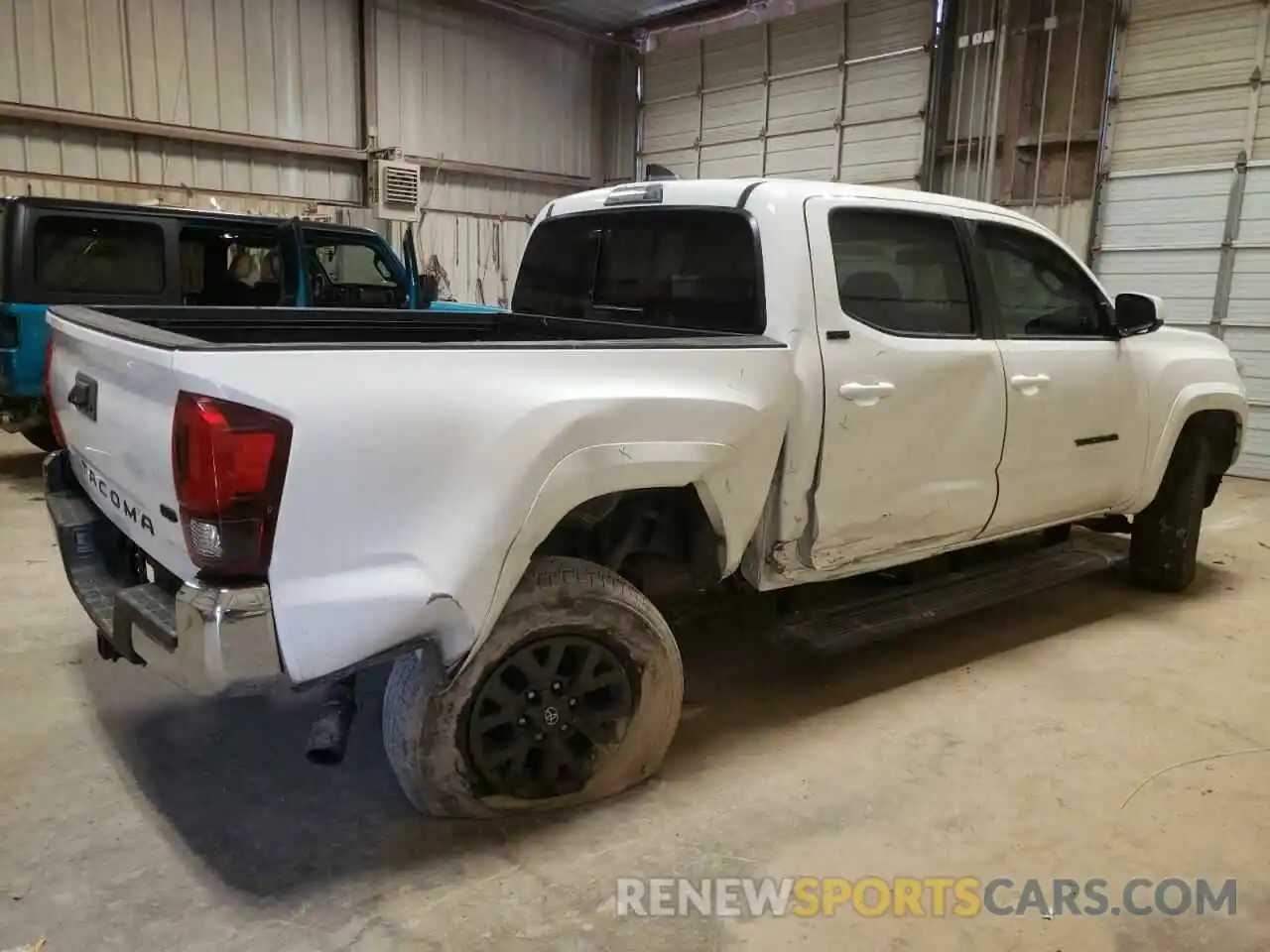 3 Photograph of a damaged car 5TFAZ5CN6MX099659 TOYOTA TACOMA 2021