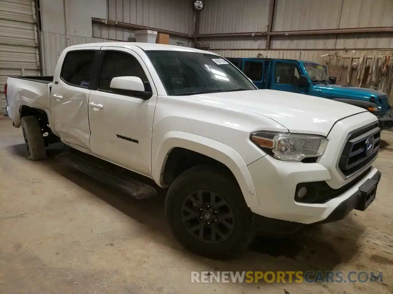 4 Photograph of a damaged car 5TFAZ5CN6MX099659 TOYOTA TACOMA 2021