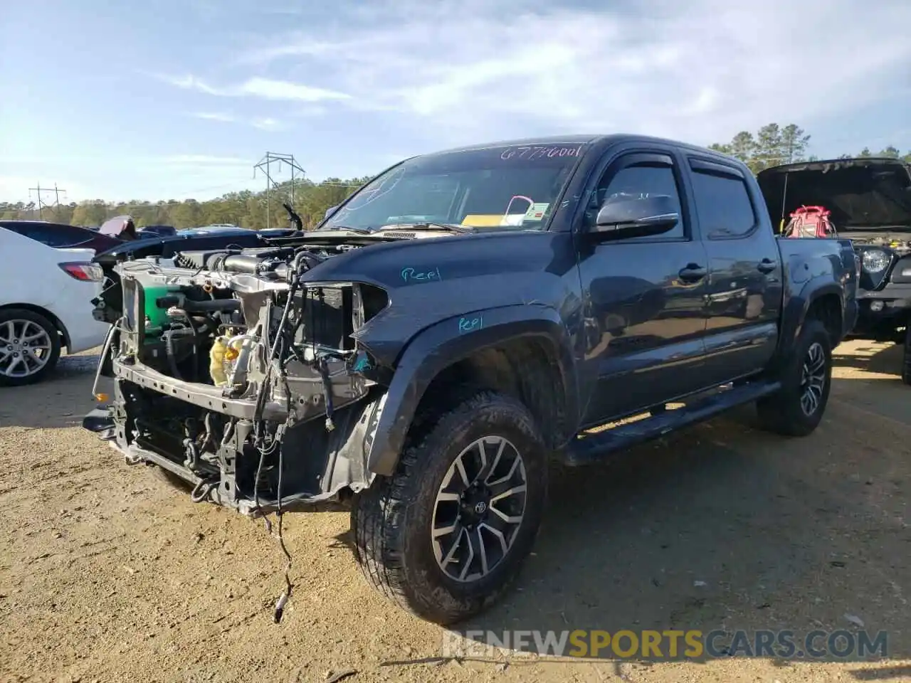 2 Photograph of a damaged car 5TFAZ5CN6MX100017 TOYOTA TACOMA 2021