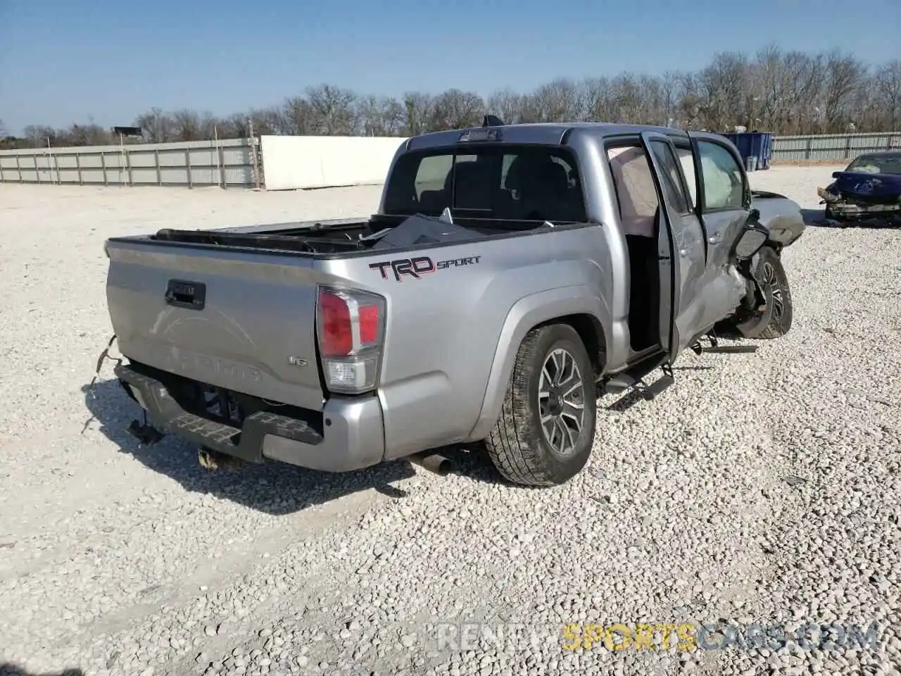 4 Photograph of a damaged car 5TFAZ5CN6MX101233 TOYOTA TACOMA 2021