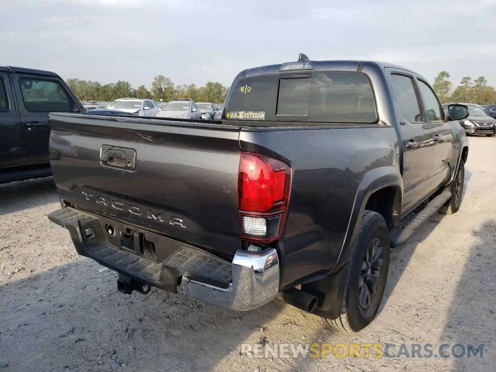 4 Photograph of a damaged car 5TFAZ5CN6MX105511 TOYOTA TACOMA 2021