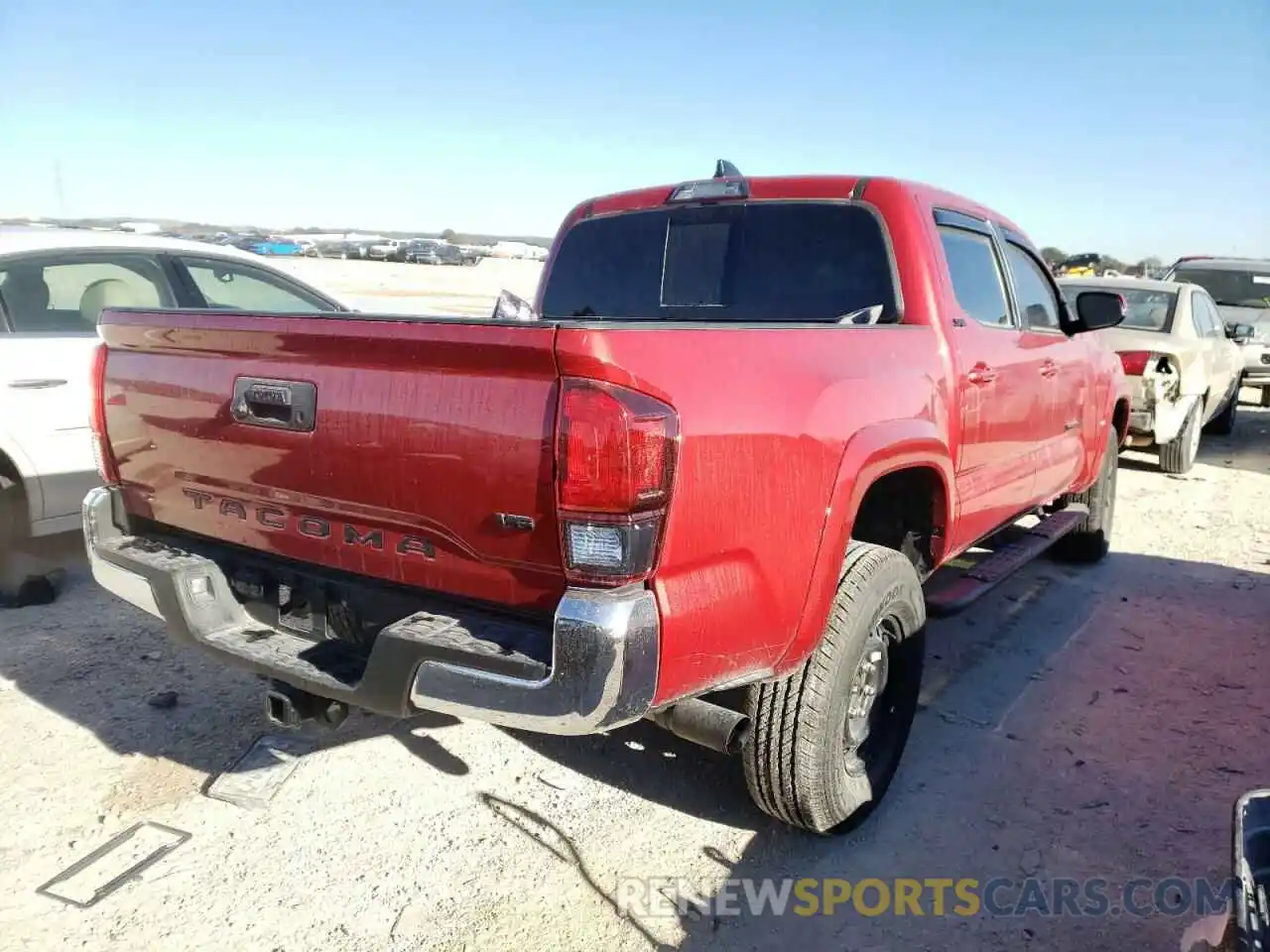 4 Photograph of a damaged car 5TFAZ5CN6MX105959 TOYOTA TACOMA 2021