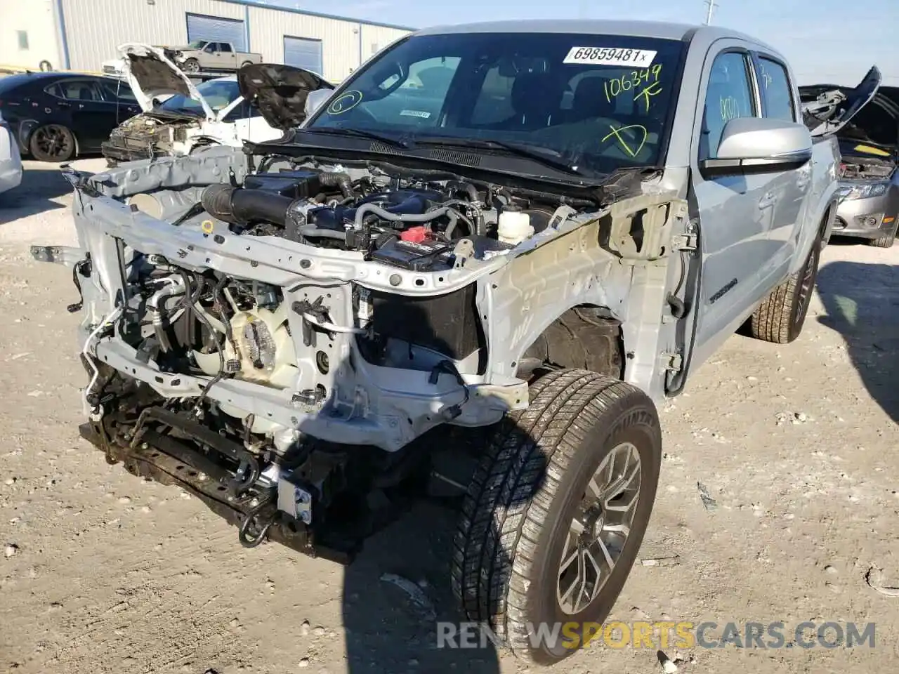 2 Photograph of a damaged car 5TFAZ5CN6MX106349 TOYOTA TACOMA 2021