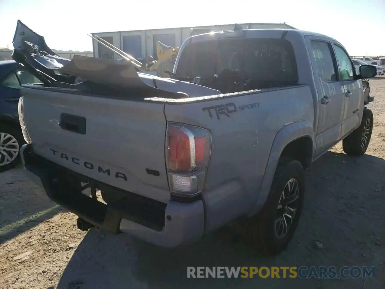 4 Photograph of a damaged car 5TFAZ5CN6MX106349 TOYOTA TACOMA 2021