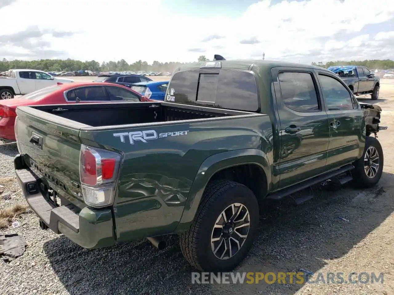 4 Photograph of a damaged car 5TFAZ5CN6MX111180 TOYOTA TACOMA 2021