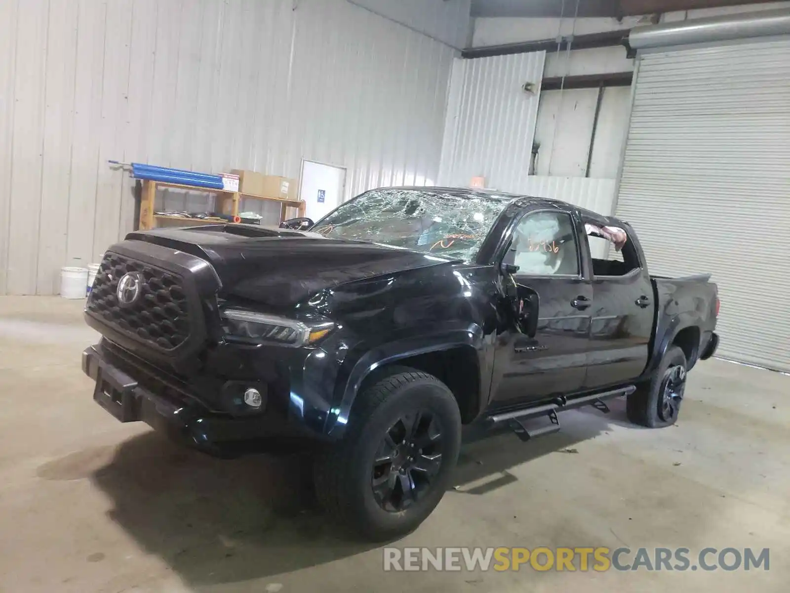 2 Photograph of a damaged car 5TFAZ5CN7MX095667 TOYOTA TACOMA 2021