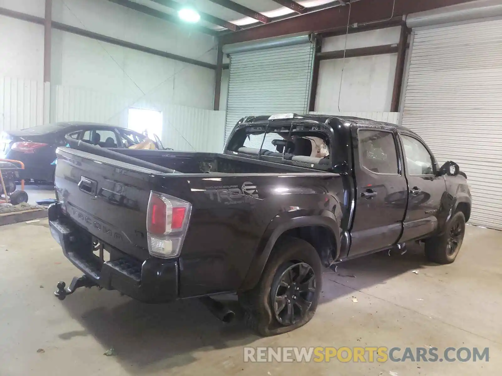 4 Photograph of a damaged car 5TFAZ5CN7MX095667 TOYOTA TACOMA 2021