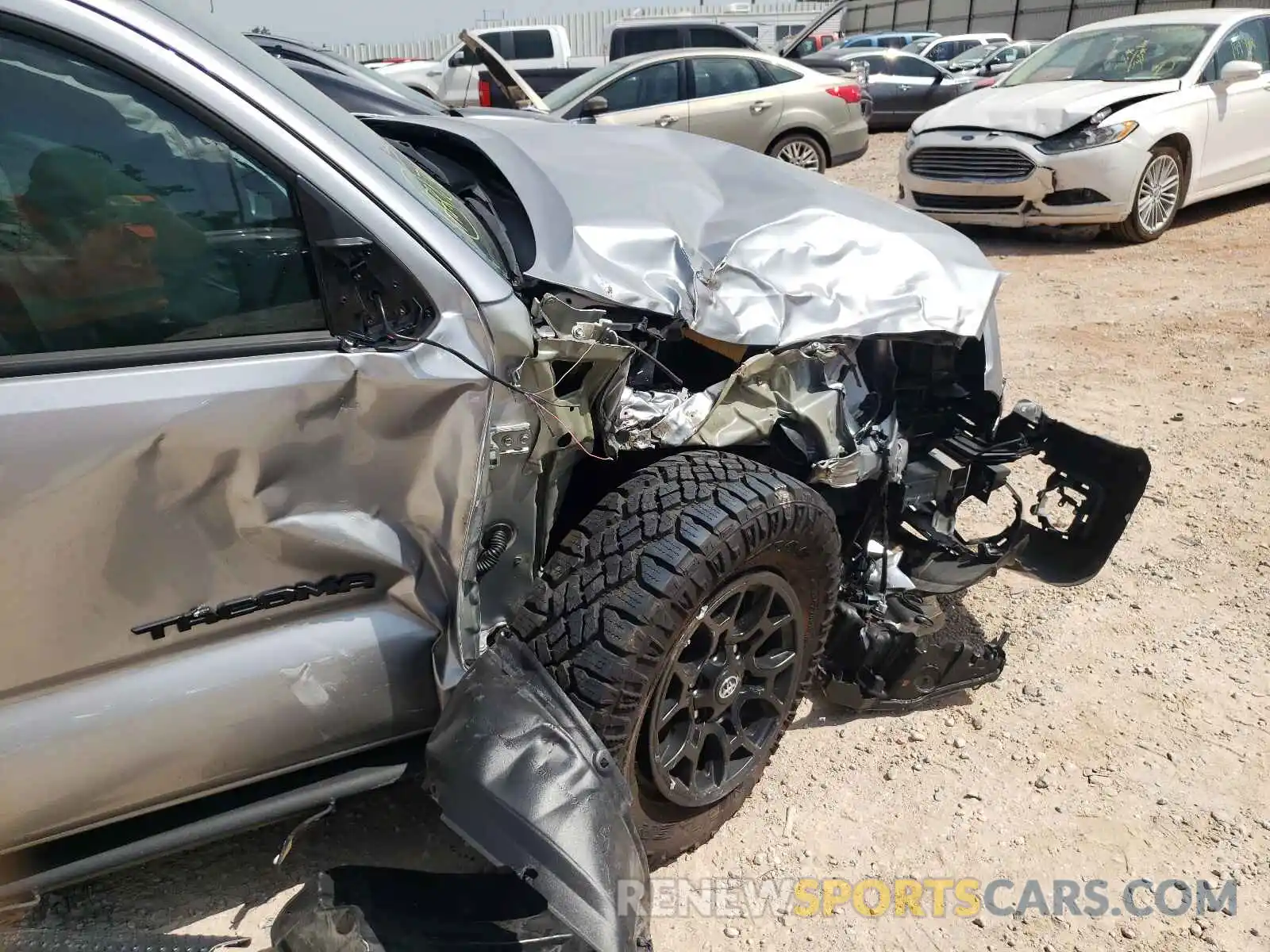 9 Photograph of a damaged car 5TFAZ5CN7MX097404 TOYOTA TACOMA 2021