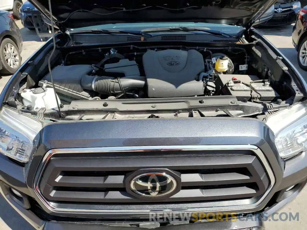 7 Photograph of a damaged car 5TFAZ5CN7MX097435 TOYOTA TACOMA 2021