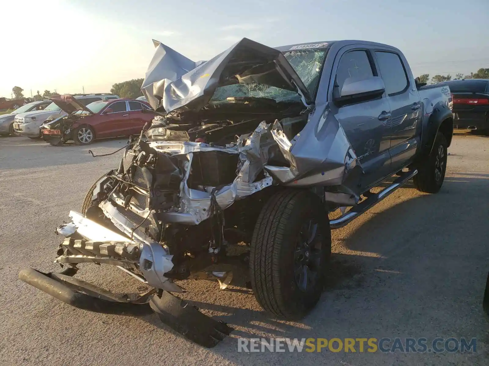 2 Photograph of a damaged car 5TFAZ5CN7MX100270 TOYOTA TACOMA 2021