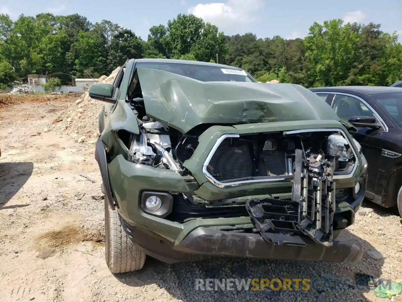 9 Photograph of a damaged car 5TFAZ5CN7MX100334 TOYOTA TACOMA 2021