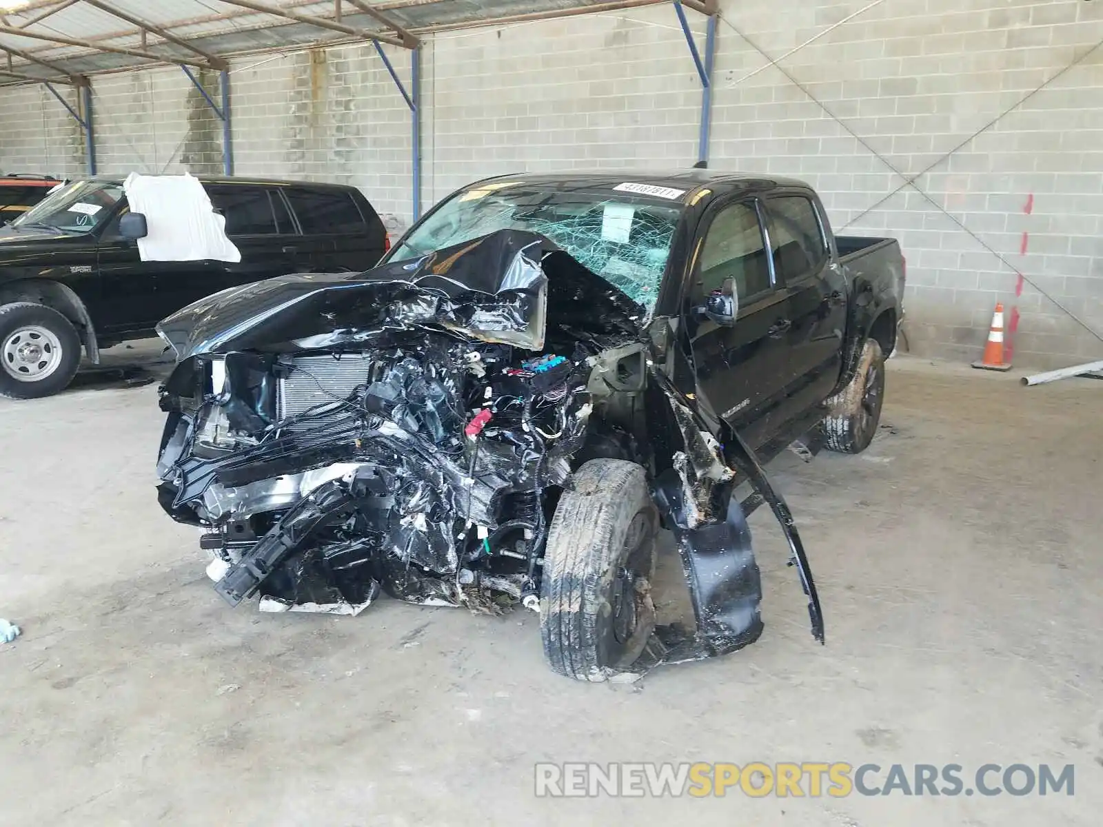 2 Photograph of a damaged car 5TFAZ5CN7MX102472 TOYOTA TACOMA 2021