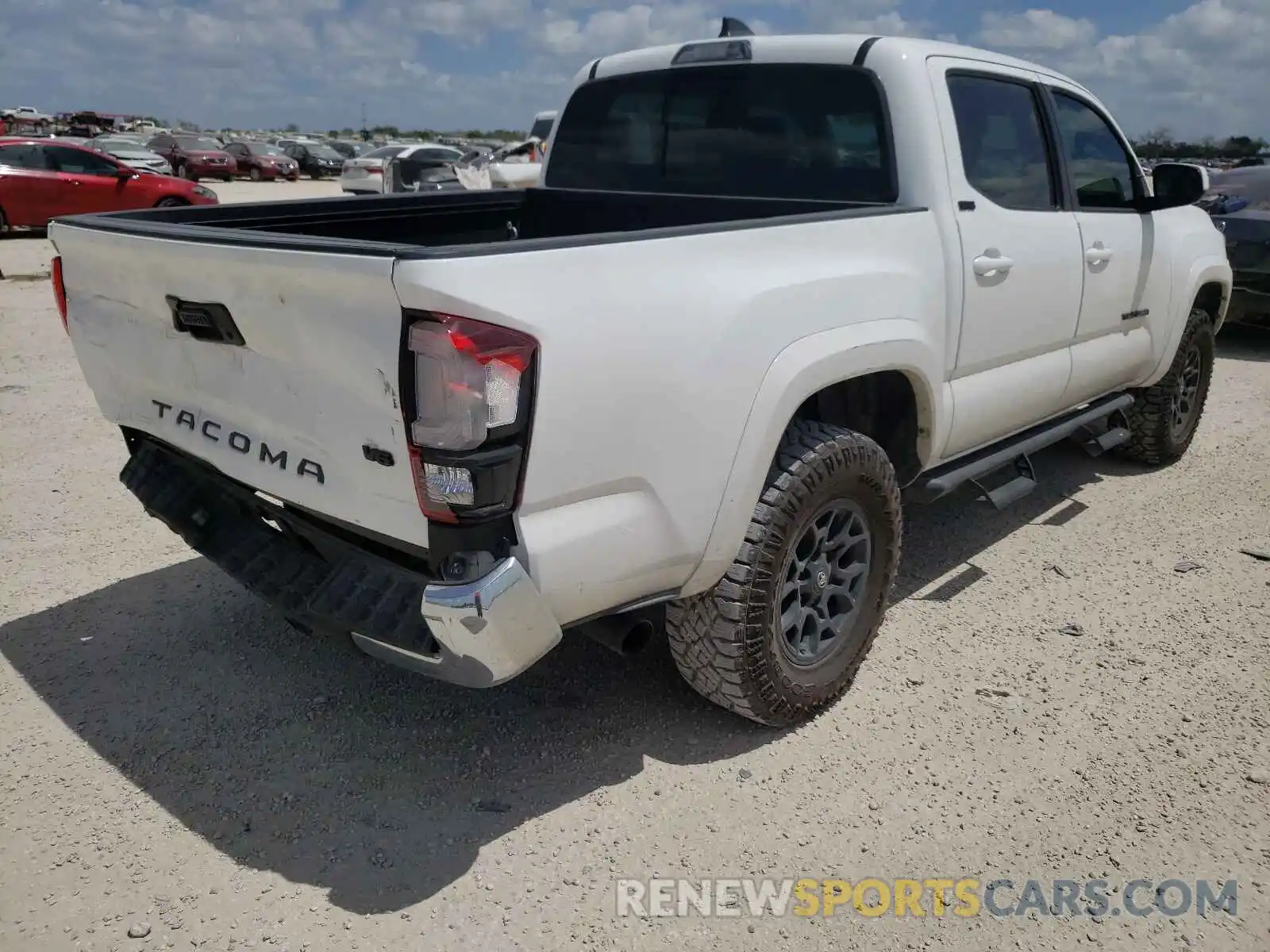 4 Photograph of a damaged car 5TFAZ5CN7MX104044 TOYOTA TACOMA 2021