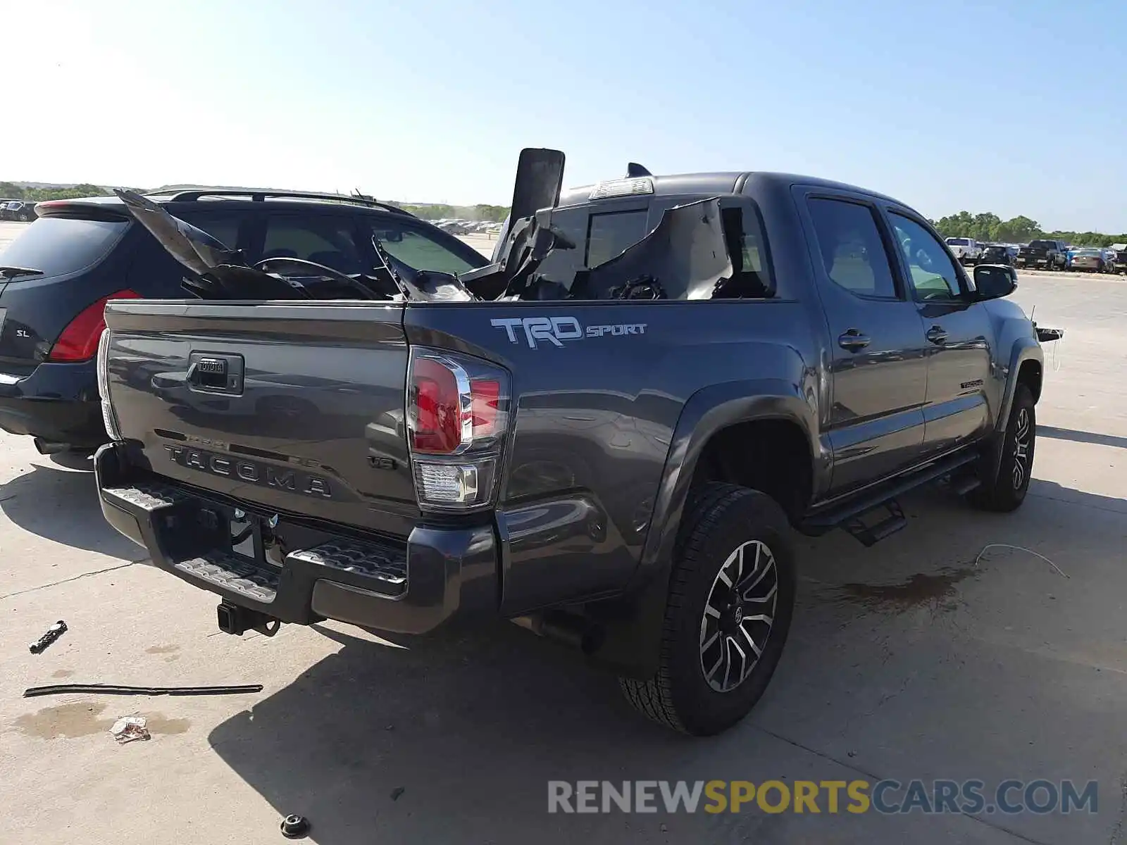 4 Photograph of a damaged car 5TFAZ5CN7MX106912 TOYOTA TACOMA 2021