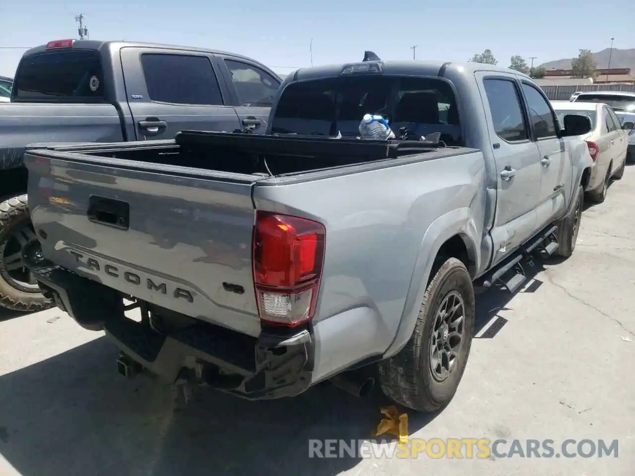 4 Photograph of a damaged car 5TFAZ5CN7MX107204 TOYOTA TACOMA 2021