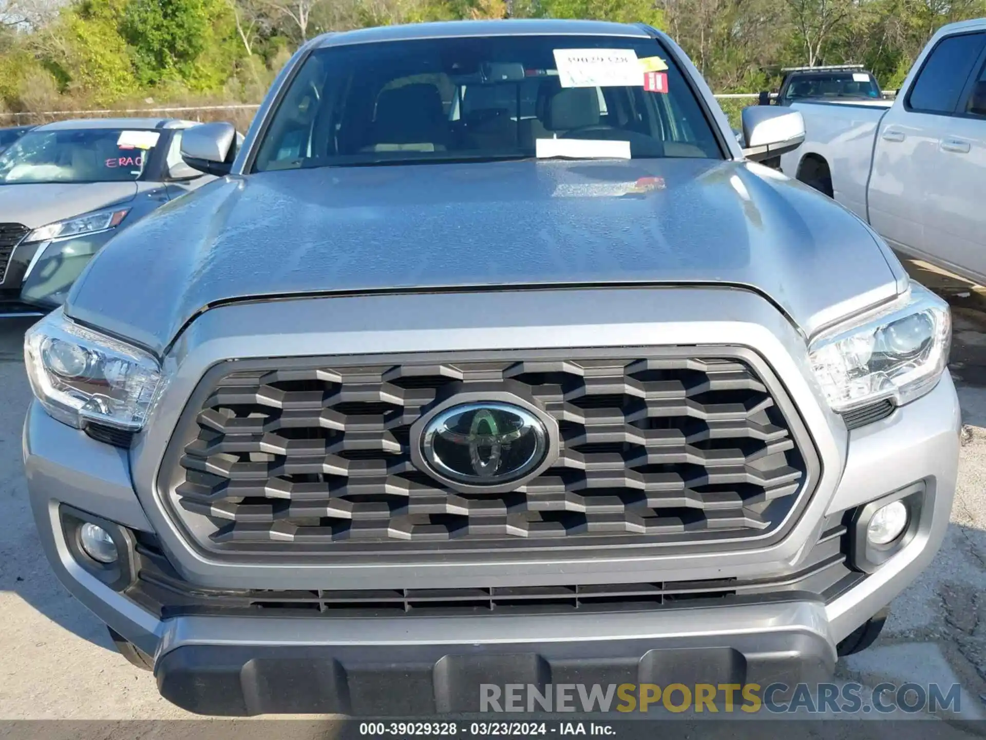 12 Photograph of a damaged car 5TFAZ5CN7MX109924 TOYOTA TACOMA 2021