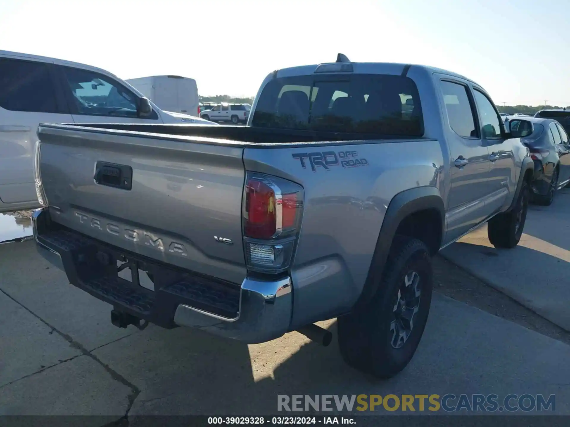 4 Photograph of a damaged car 5TFAZ5CN7MX109924 TOYOTA TACOMA 2021