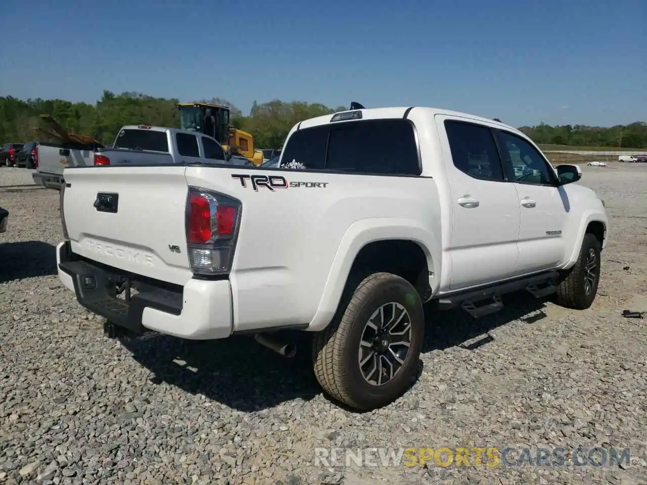 4 Photograph of a damaged car 5TFAZ5CN7MX110023 TOYOTA TACOMA 2021