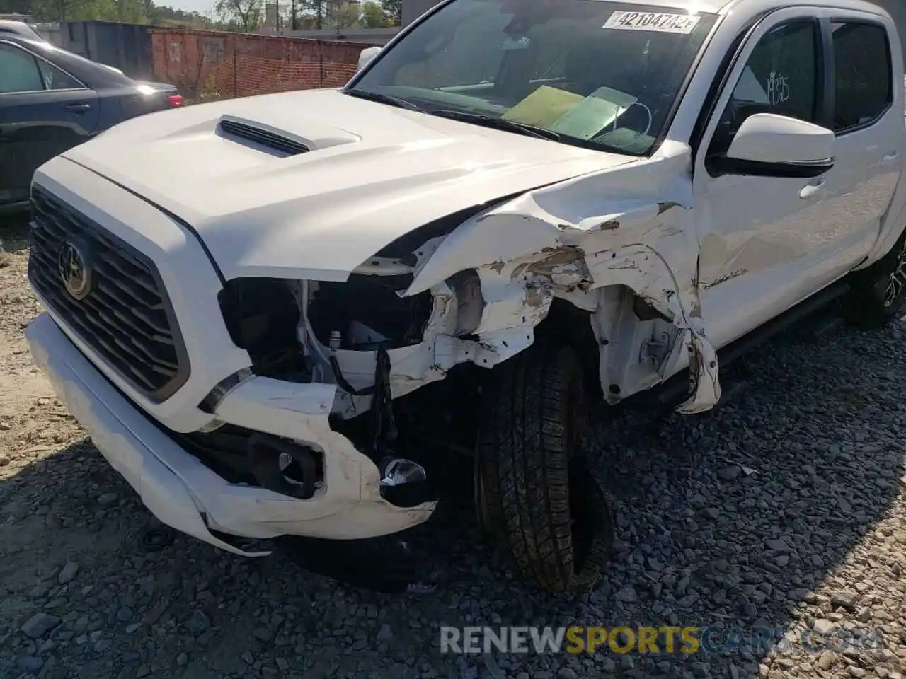 9 Photograph of a damaged car 5TFAZ5CN7MX110023 TOYOTA TACOMA 2021