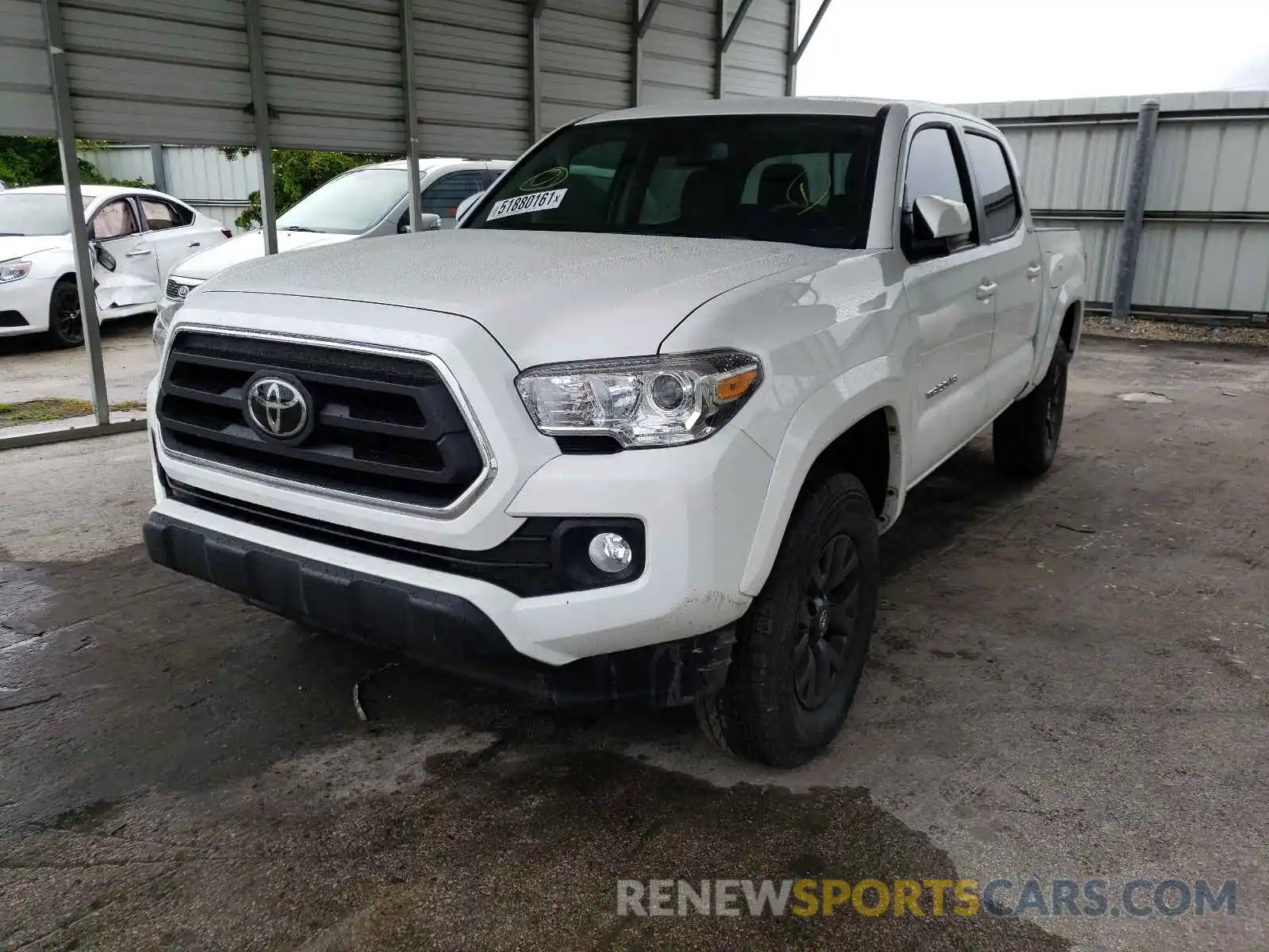 2 Photograph of a damaged car 5TFAZ5CN7MX110331 TOYOTA TACOMA 2021