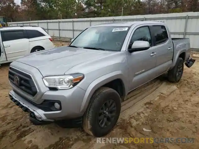 2 Photograph of a damaged car 5TFAZ5CN7MX116825 TOYOTA TACOMA 2021