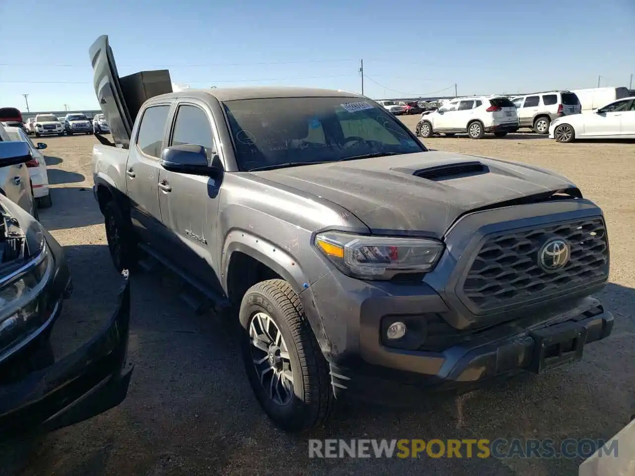 1 Photograph of a damaged car 5TFAZ5CN8MX095225 TOYOTA TACOMA 2021