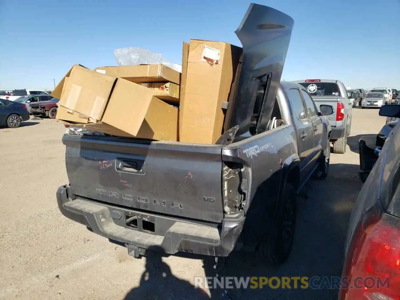 4 Photograph of a damaged car 5TFAZ5CN8MX095225 TOYOTA TACOMA 2021