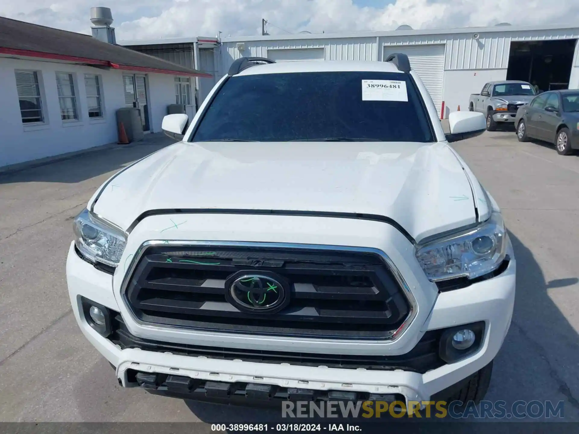 12 Photograph of a damaged car 5TFAZ5CN8MX096813 TOYOTA TACOMA 2021