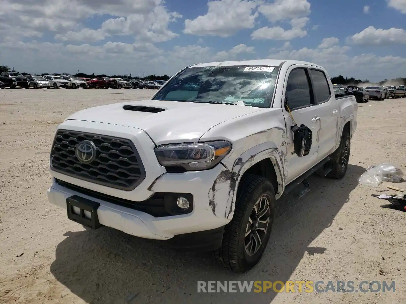 2 Photograph of a damaged car 5TFAZ5CN8MX097301 TOYOTA TACOMA 2021