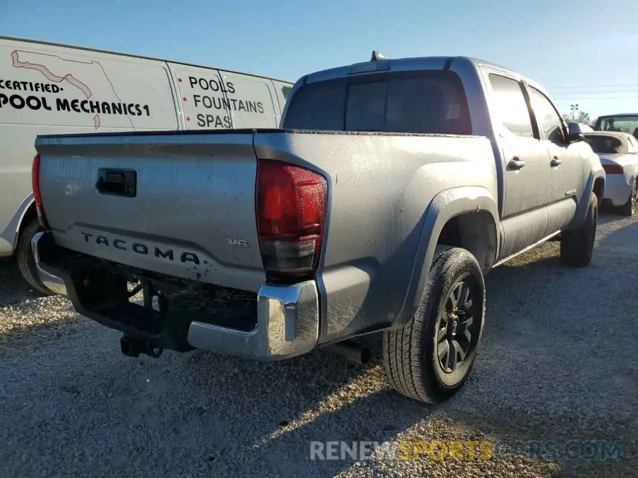 4 Photograph of a damaged car 5TFAZ5CN8MX101394 TOYOTA TACOMA 2021