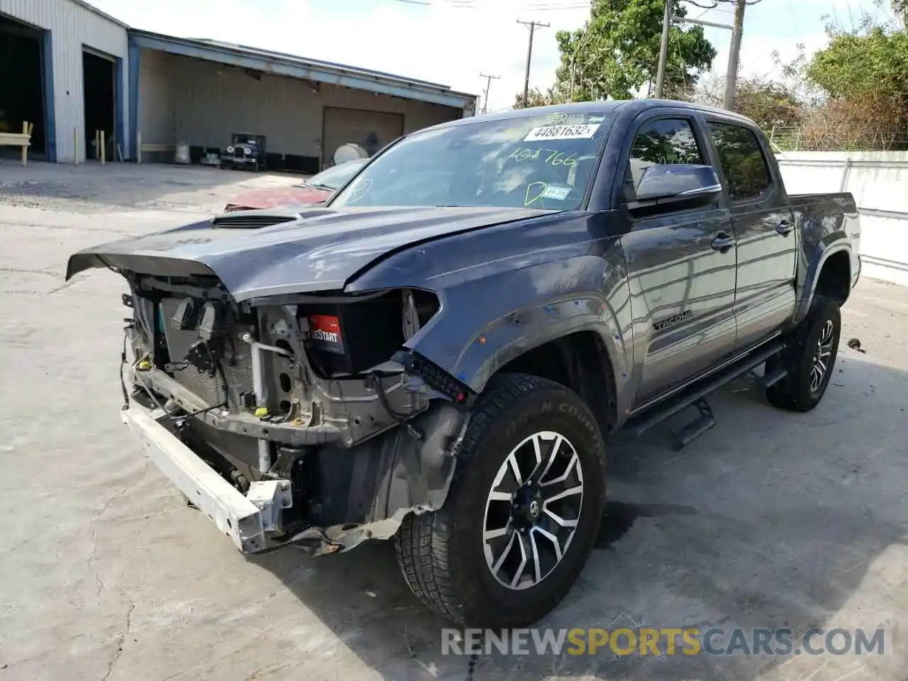 2 Photograph of a damaged car 5TFAZ5CN8MX101766 TOYOTA TACOMA 2021