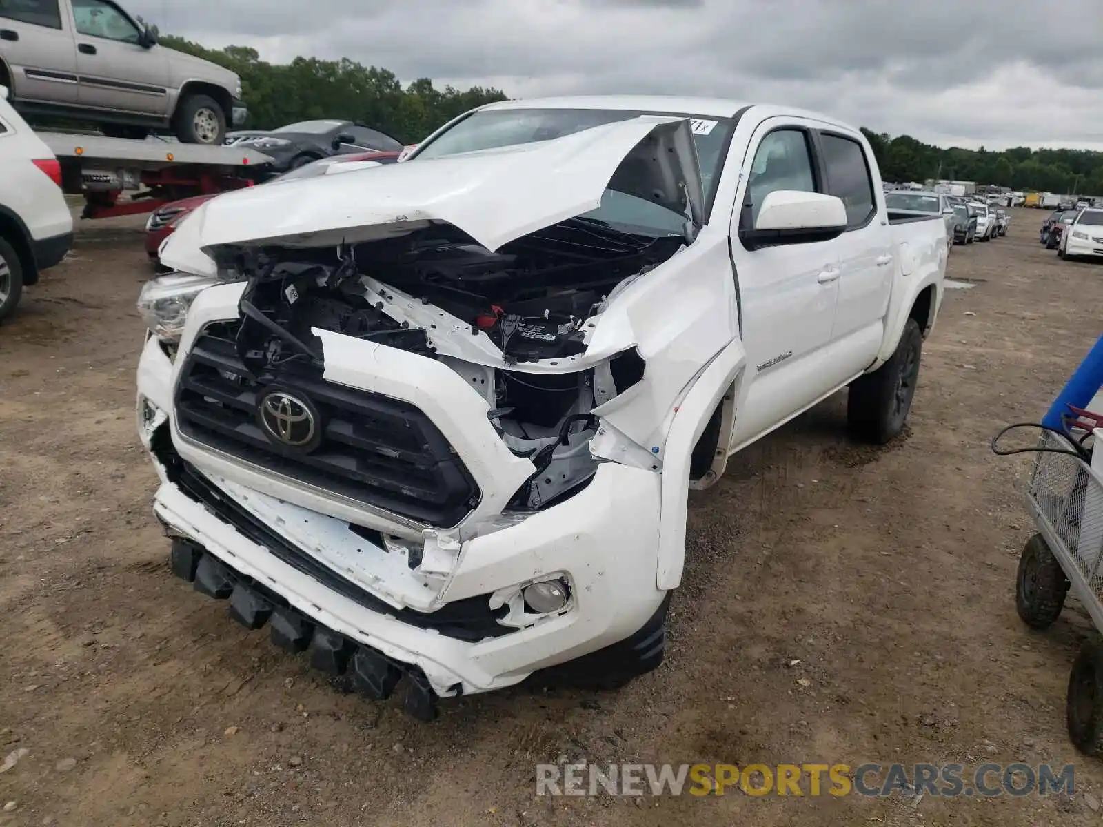 2 Photograph of a damaged car 5TFAZ5CN8MX106031 TOYOTA TACOMA 2021